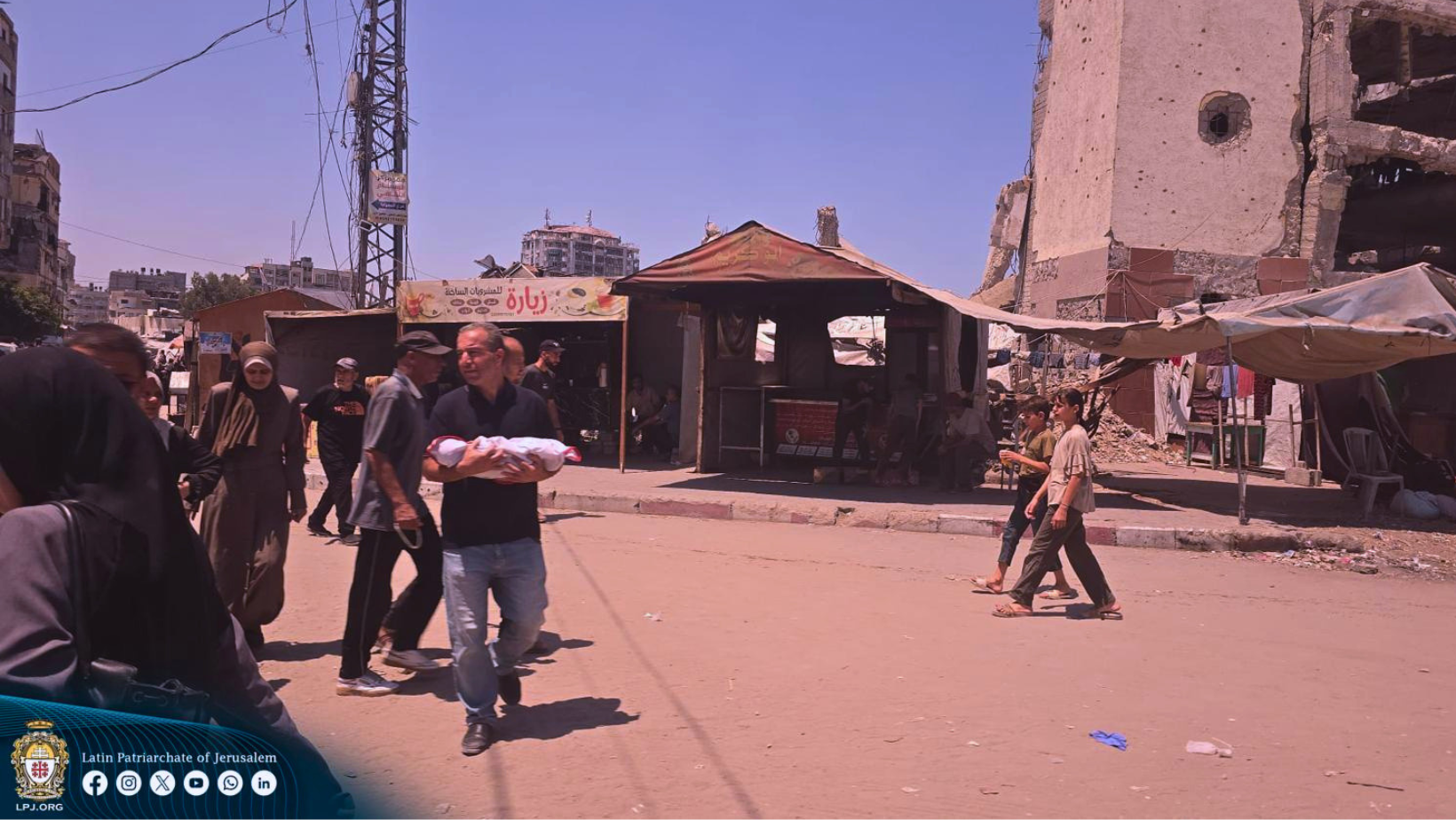 People among the rubble of destroyed buildings in Gaza during the humanitarian crisis.